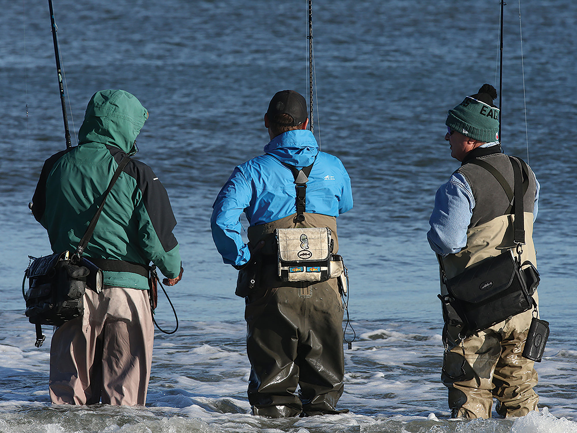 Anglers fishing in the surf